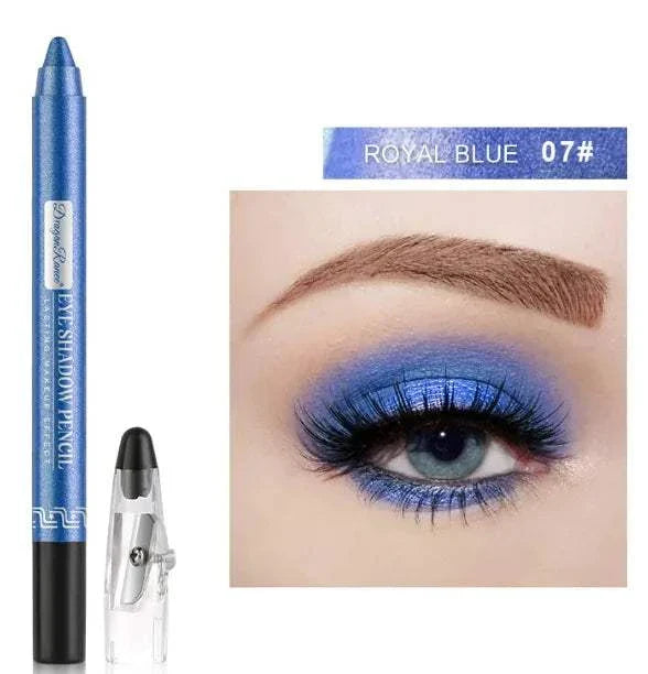 Silkworm Penknife Eyeliner in royal blue with pearlescent finish and sharp application tip shown with vibrant blue eye makeup look