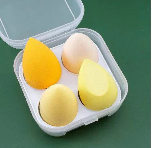 Set of 4 makeup sponge powder puffs in different colors for dry and wet application in a clear plastic case