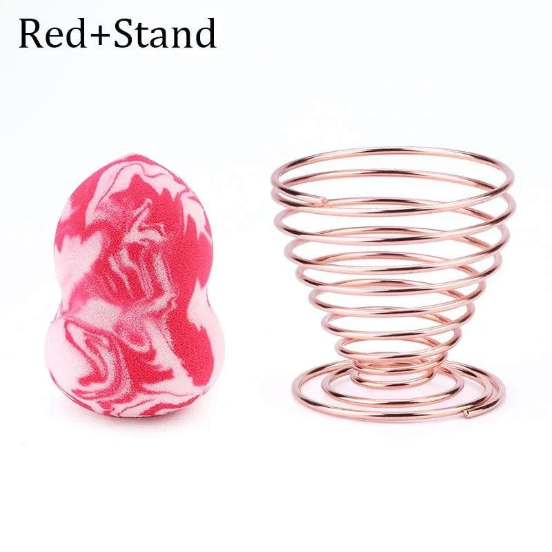 roze wit gemarmerde makeup sponge in druppelvorm met metalen houder voor cosmetisch gebruik