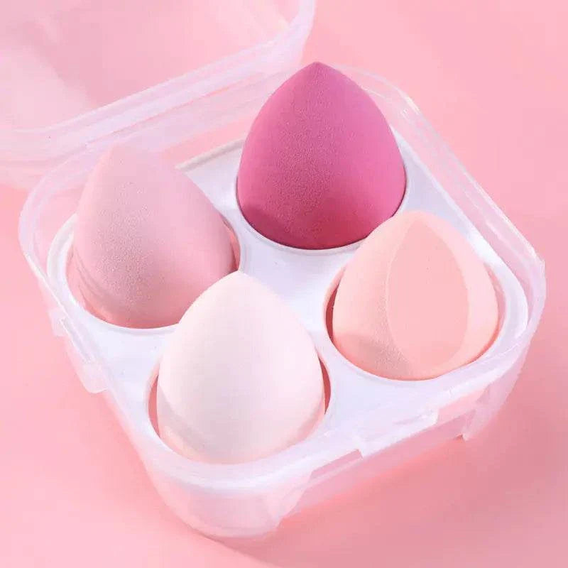 Set of 4 pink makeup sponge powder puffs for dry and wet application in clear storage case