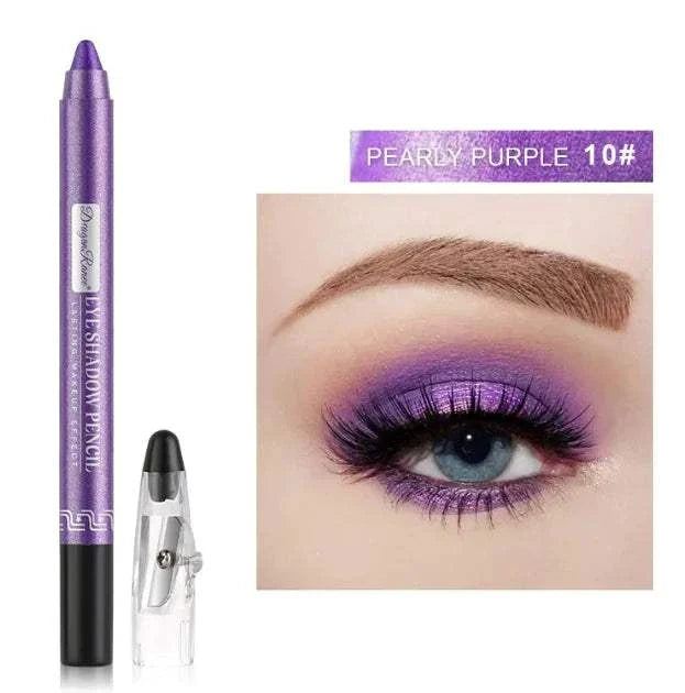 Silkworm Penknife Eyeliner in pearly purple with bold purple eye makeup and sharp winged look